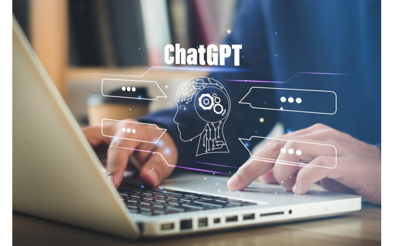 A person with laptop is working with chatGPT.